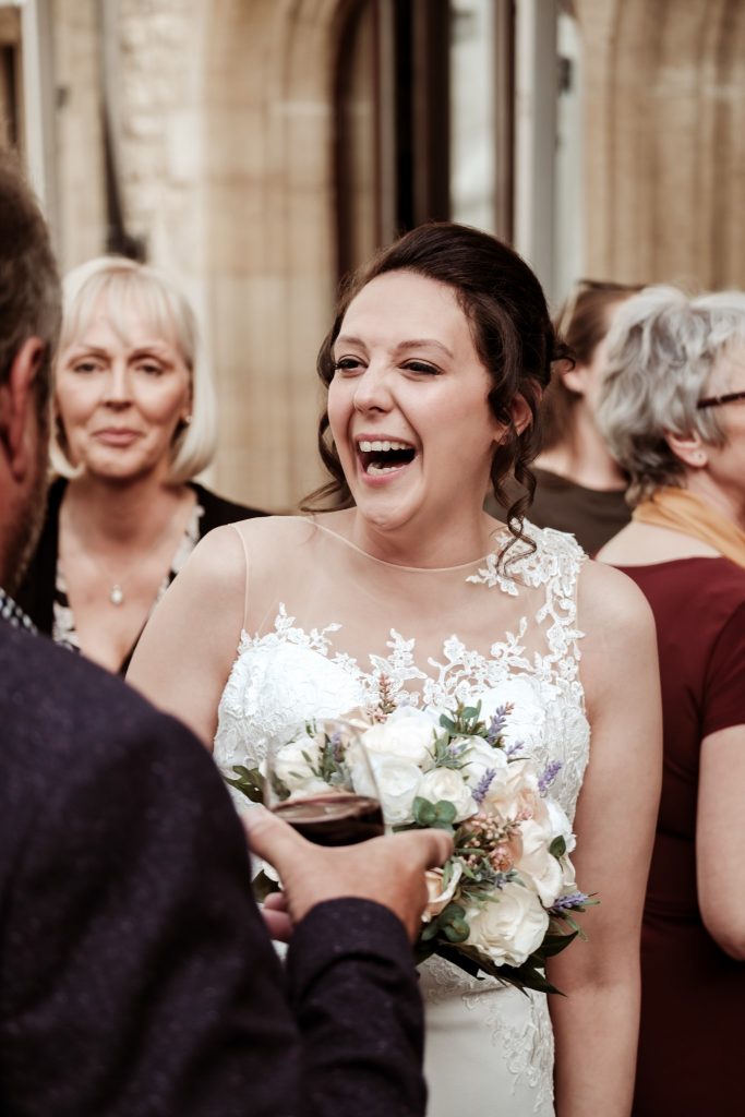 Candid documentary wedding in Oxford St Cross College