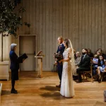 Bride and groom in dramatic lighting at their wedding at Primrose Hill Farm